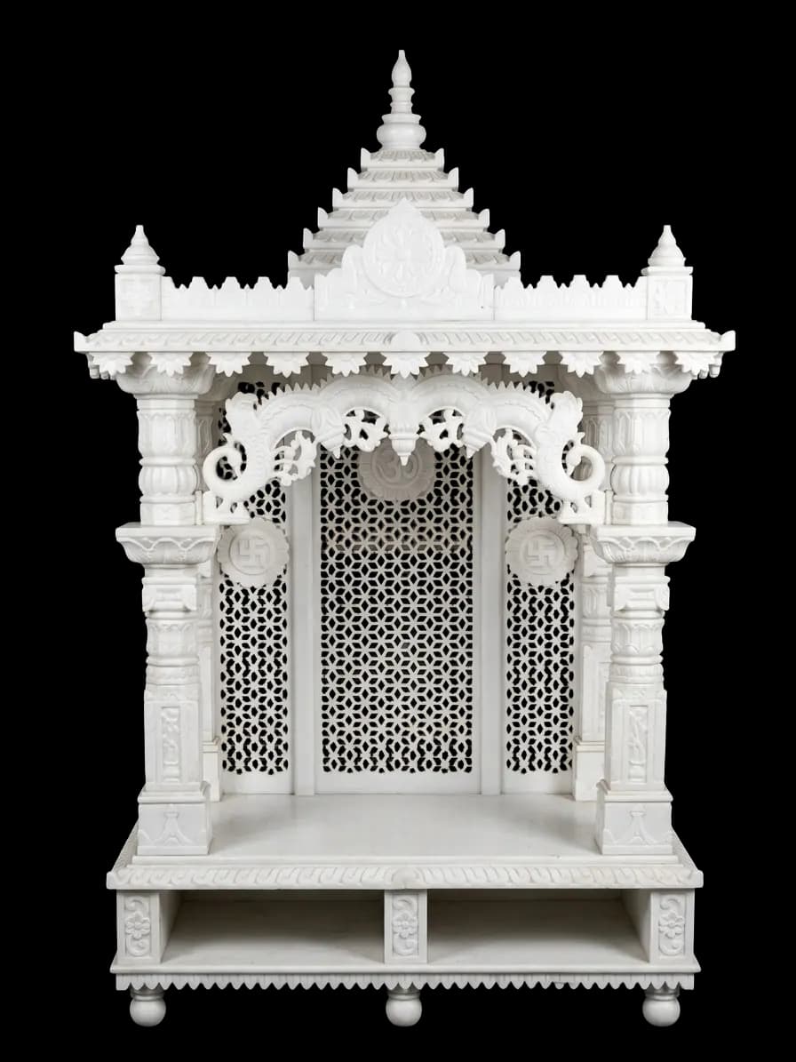Beautiful marble home mandir placed according to Vastu Shastra guidelines